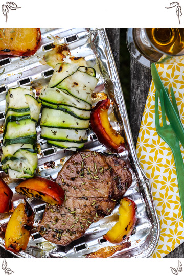 Pork Loin Steaks with grilled nectarins and sheep cheese zucchini rolls